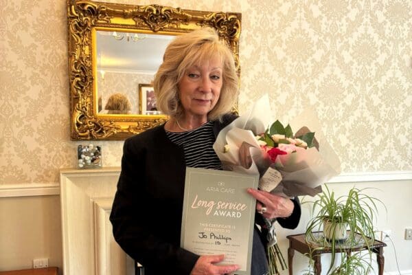 Receptionist celebrates 15 years at Tall Trees